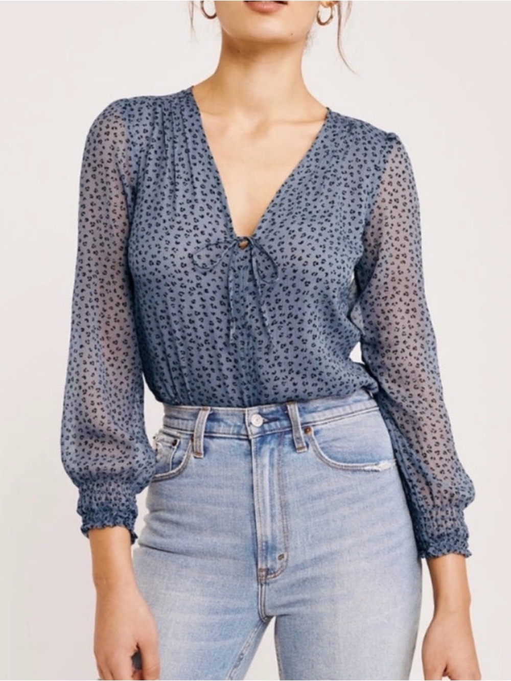 Abercrombie & Fitch Blue Cheetah Print V-Neck Bodysuit. Size M